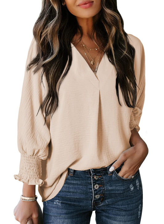 Women's casual 3/4 sleeve V-neck top with loose fit and smock sleeves.