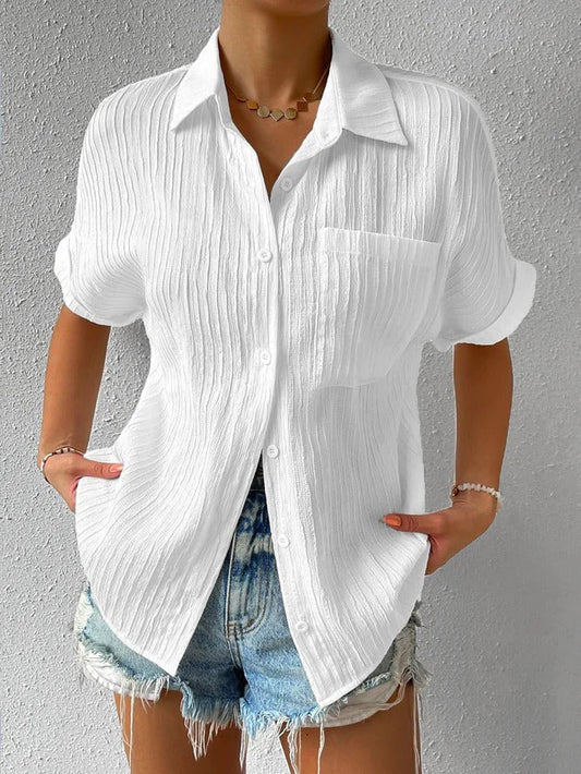 Shirt collar casual buttoned loose blouse with short sleeves, cotton blend, and a plain pattern in white.